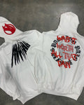 Black loose hooded sweatshirt with white skull print and rhinestone details, cardigan style with long sleeves