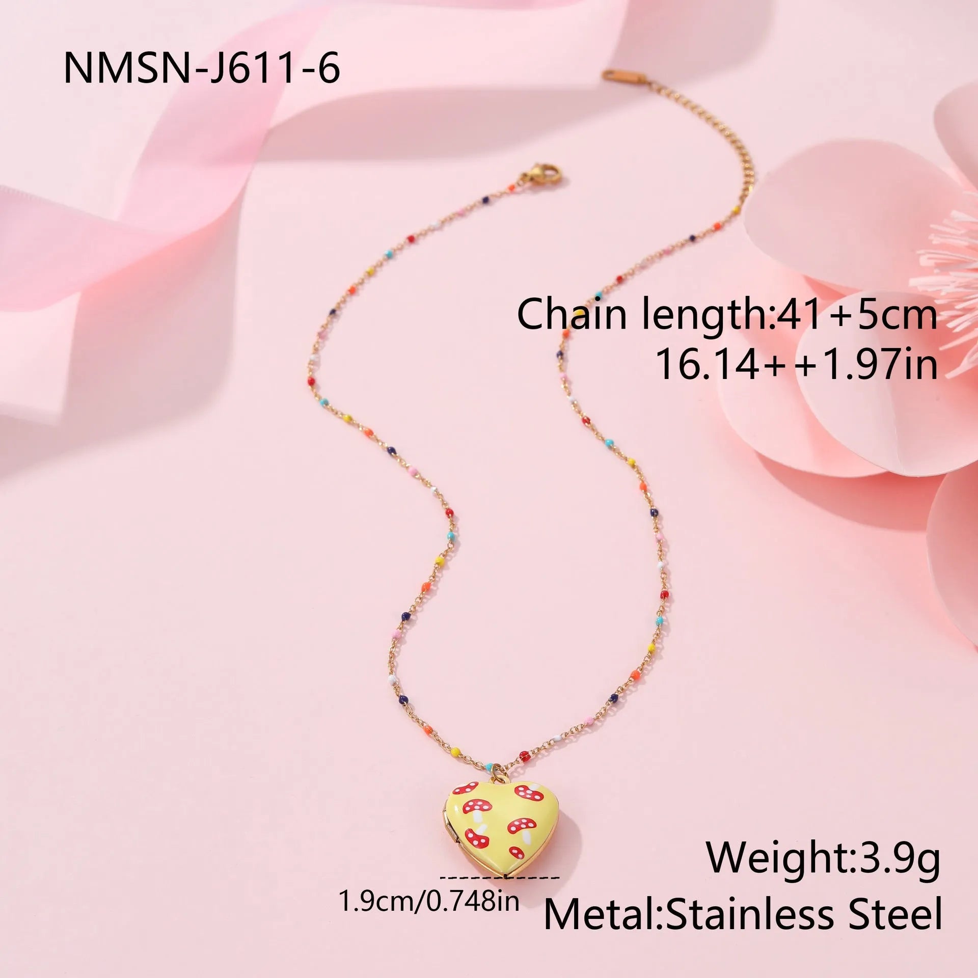 Gold-plated heart-shaped fruit pendant necklace on a stainless steel chain, showing grape design detail.