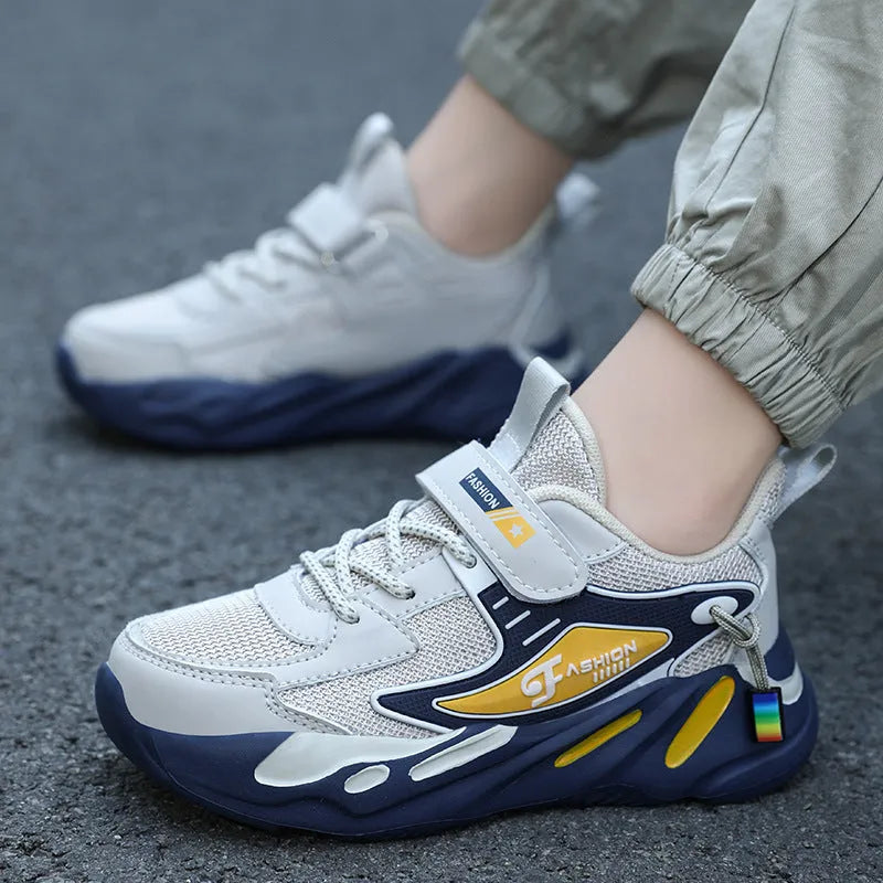 Boy's dark blue and black Velcro-fastened platform sports running shoes with breathable mesh upper.