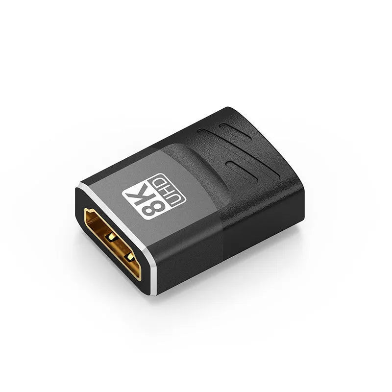 8K HDMI interface converter cable with gold-plated connectors and PVC housing on a desk