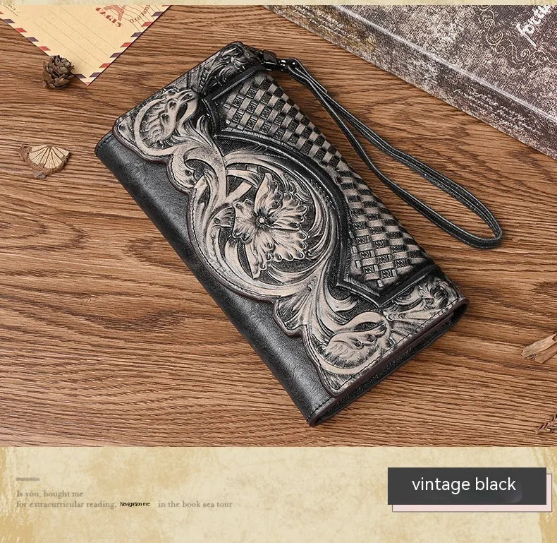 Retro brown embossed floral pattern tri-fold women's wallet made of genuine cowhide leather.