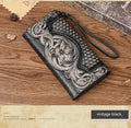 Retro brown embossed floral pattern tri-fold women's wallet made of genuine cowhide leather.