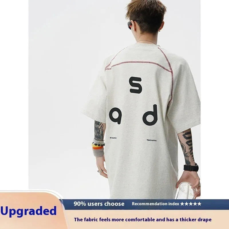 Cotton loose fit t-shirt with letter print design on front, showing round neck and short sleeves