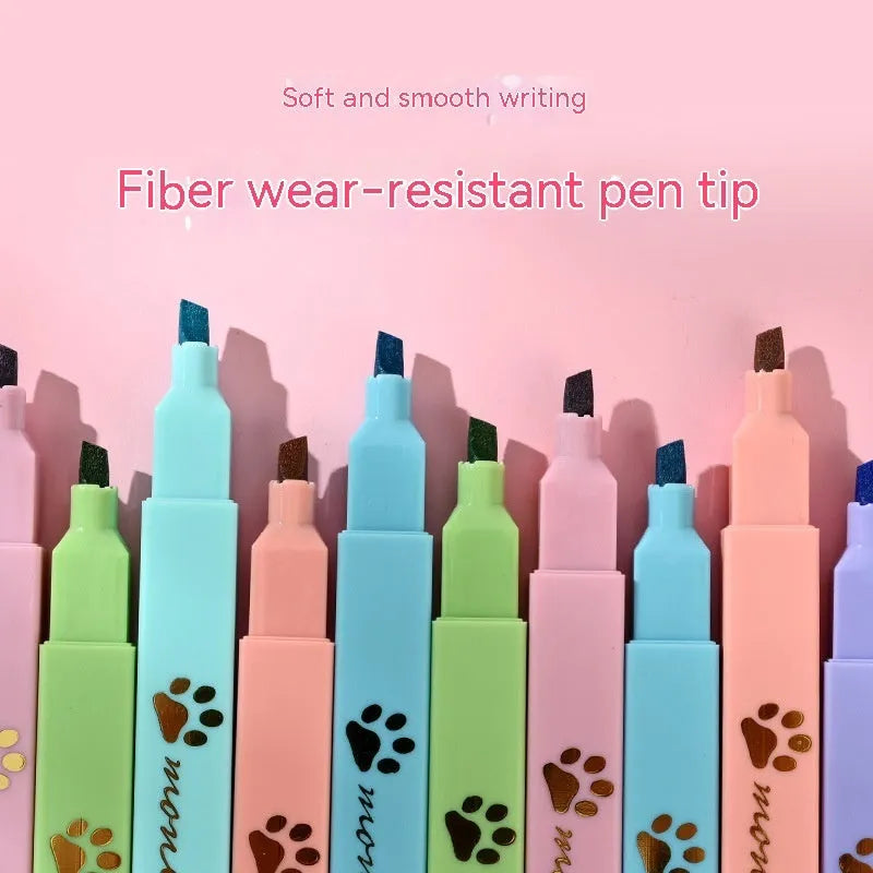 Box of six cat's paw shaped fluorescent marking pens in assorted colours with oblique nibs.