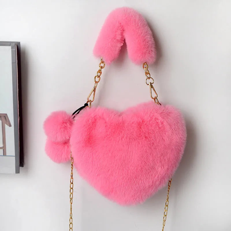 Heart-shaped women's plush handbag with soft texture and detachable shoulder strap in medium size