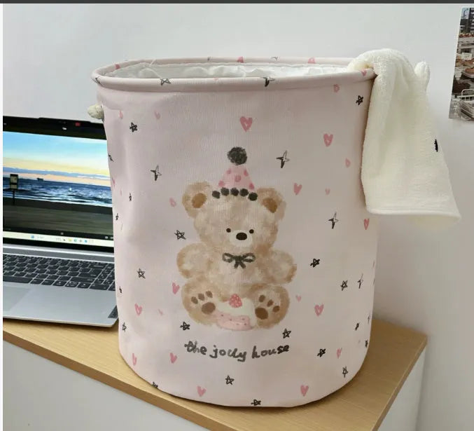 Foldable cotton laundry basket in a colourful design, shown unfolded for use.