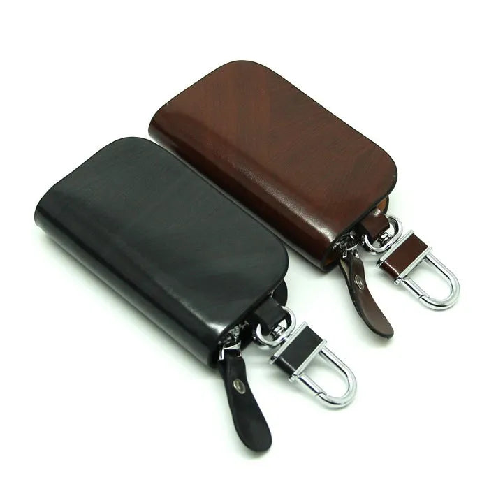 Genuine leather car key case with frosted finish showing black and brown colour options