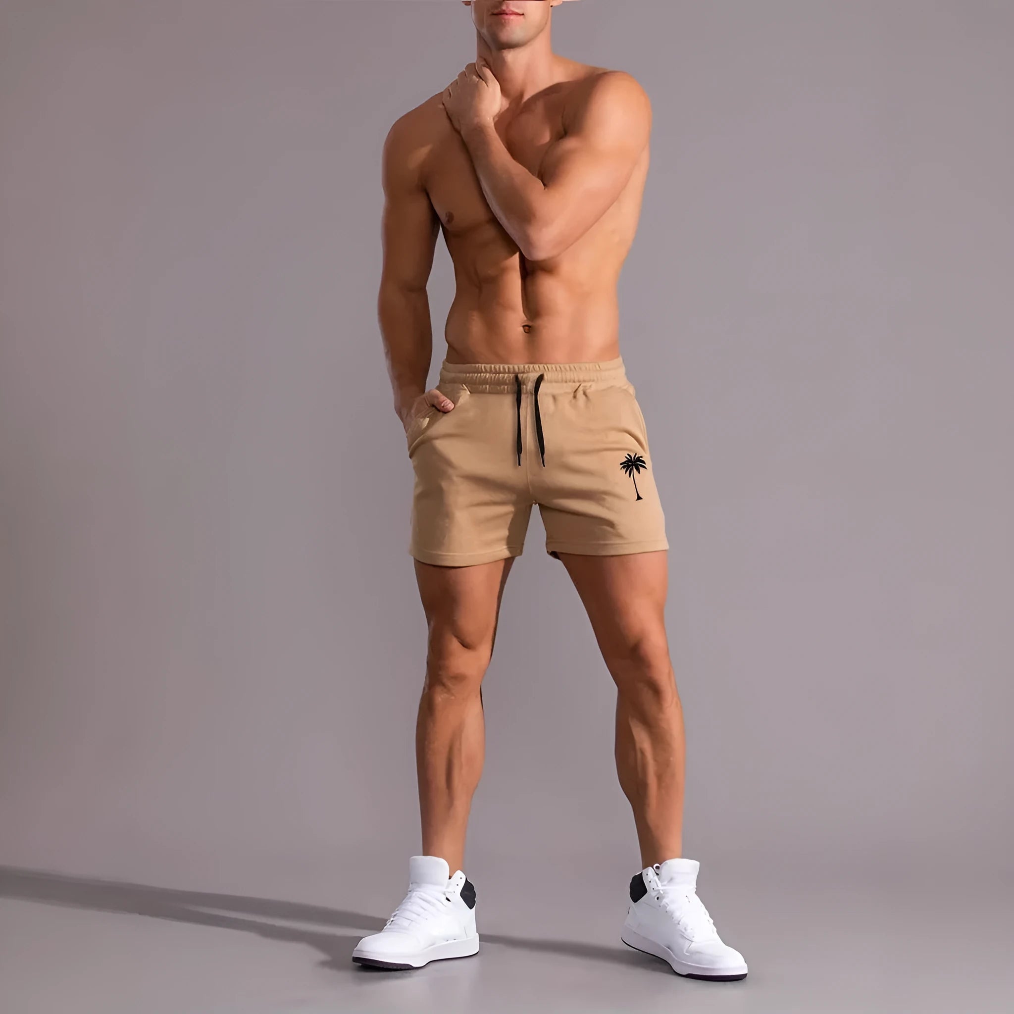 Man wearing khaki coconut print polyester sports shorts