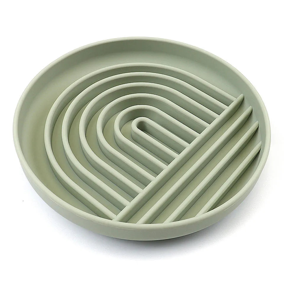 Silicone slow feeder dog bowl with ridges, shown in mustard green colour