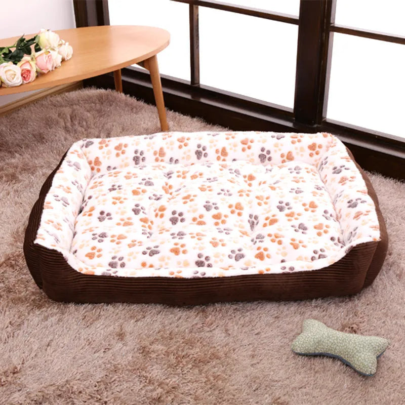 Soft plush dog bed with raised sofa edge in beige colour for small pets