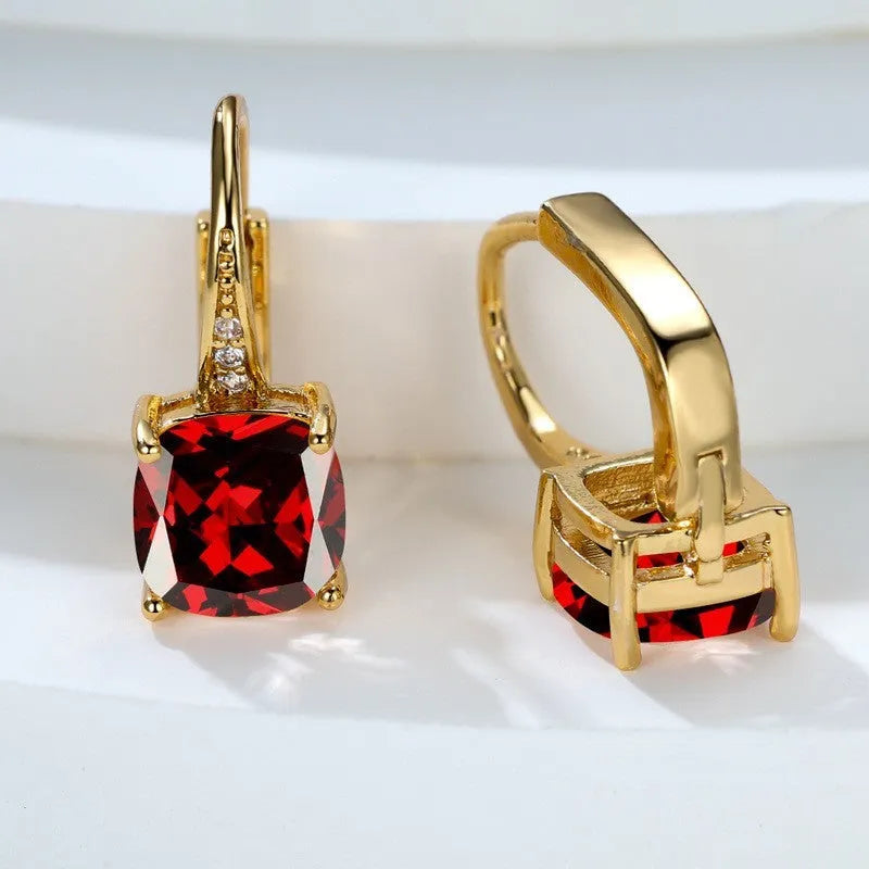 Square geometric zirconia ear hook earrings in a selection of gold, rose gold and platinum plated colours.