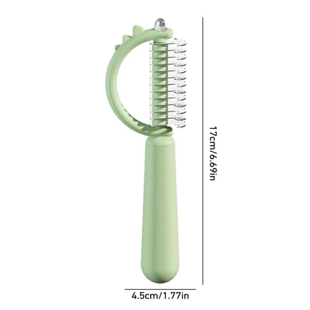 Blue dinosaur-shaped self-cleaning cat brush with double-sided stainless steel slicker pins.