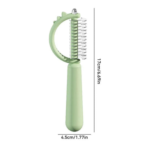 Blue dinosaur-shaped self-cleaning cat brush with double-sided stainless steel slicker pins.