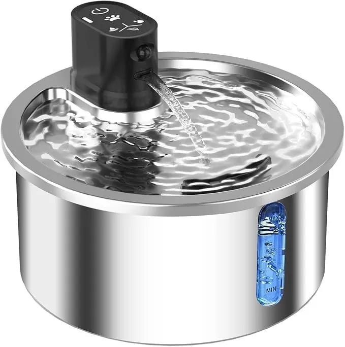 White stainless steel heated water fountain for cats and dogs on a counter