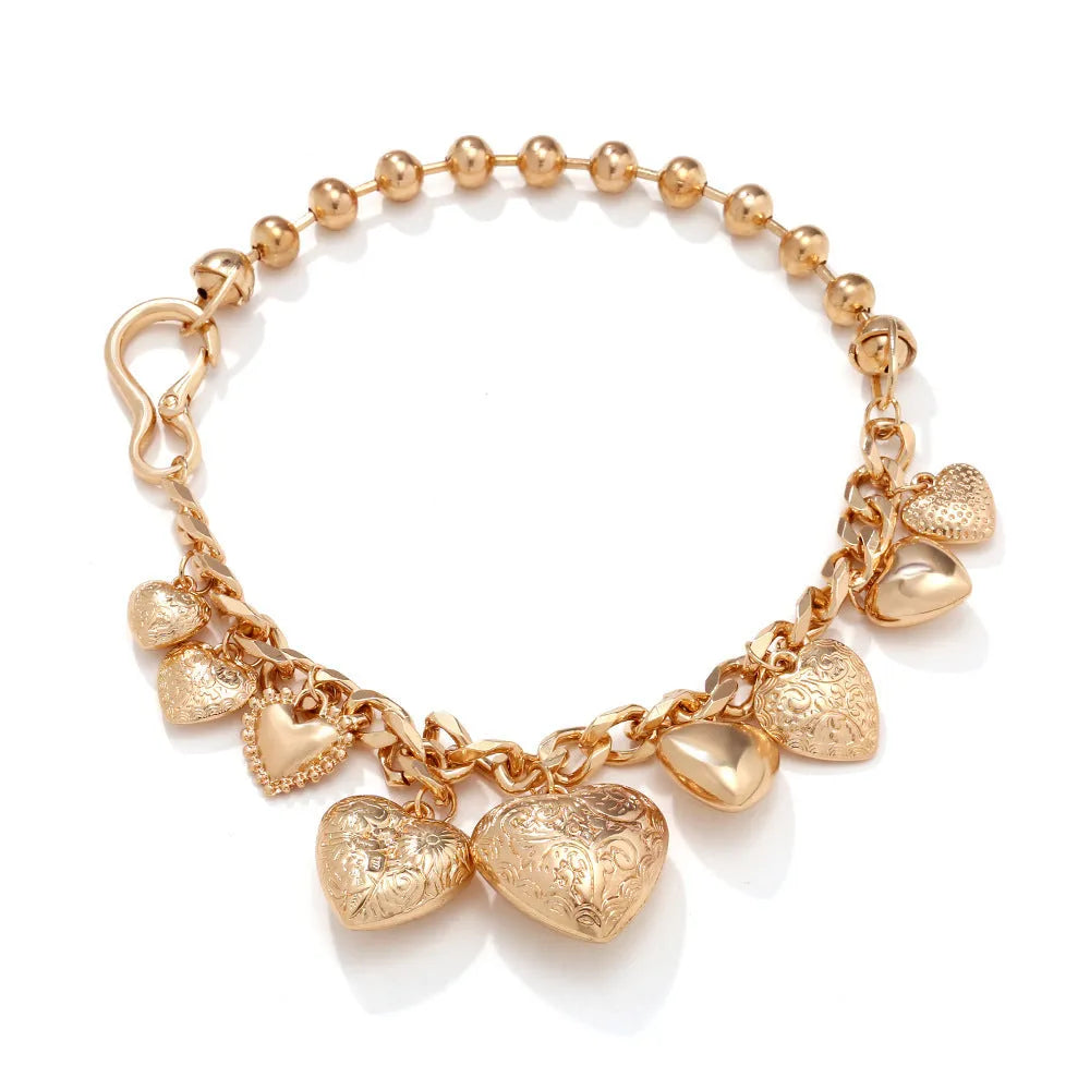 Women's gold carved heart pendant necklace on metal chain with adjustable 41-50cm length