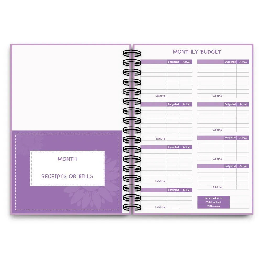 J12 purple coil-bound financial planning notebook with budget stickers and paper clips