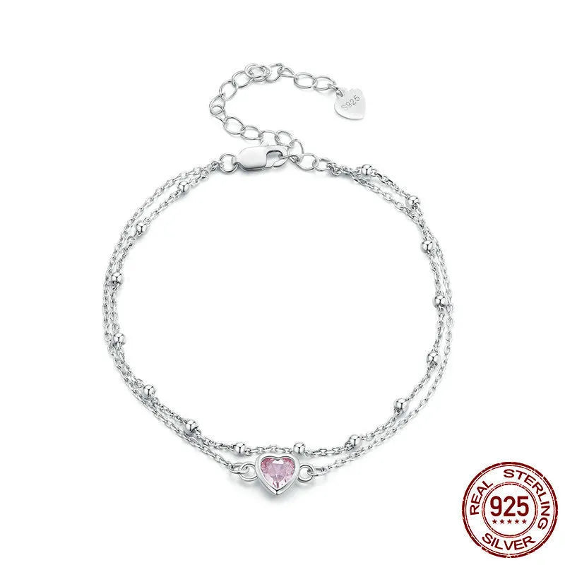 Women's sweet style 925 sterling silver bracelet with a small heart pendant on an adjustable chain.
