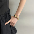 Irregular wide-brimmed zinc alloy bracelet with spring open design and electroplated finish in simple style