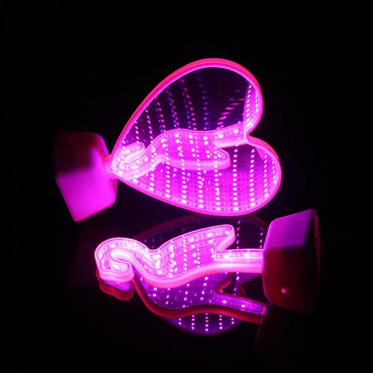 Rose red double-sided LED love tunnel decorative light on a table.