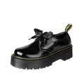 Women's thick soled leather shoes with ribbon and cross strap details in white or black