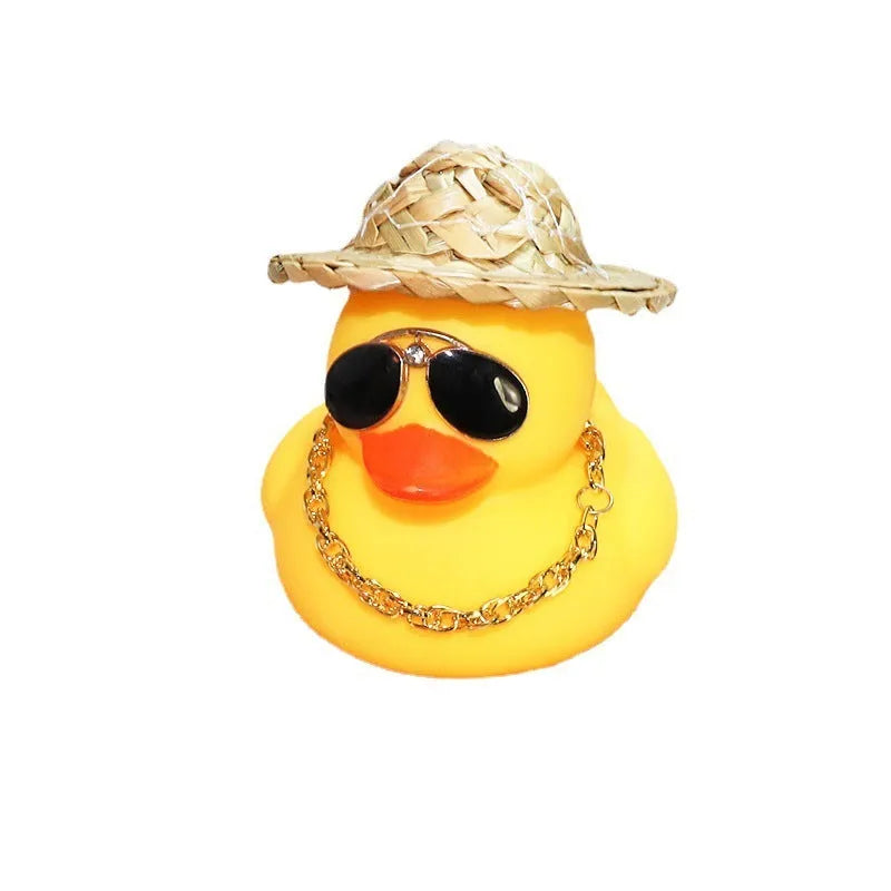 Yellow duck car dashboard ornament with straw hat, matte finish, and included adhesive base with sunglasses necklace