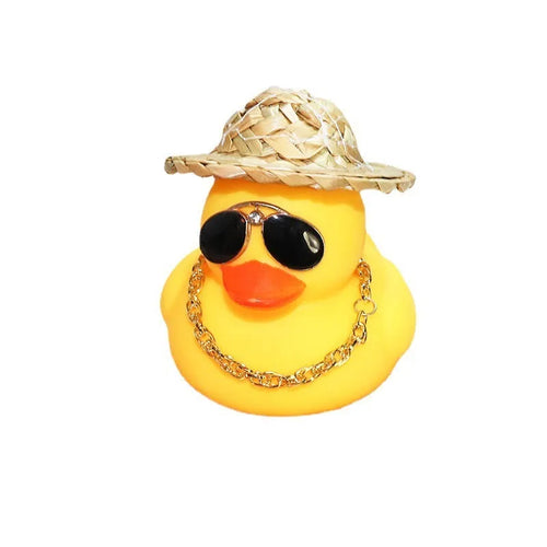 Yellow duck car dashboard ornament with straw hat, matte finish, and included adhesive base with sunglasses necklace