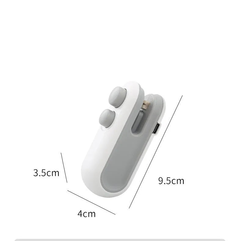 White handheld bag sealer with USB charging port and cutter blade for food storage