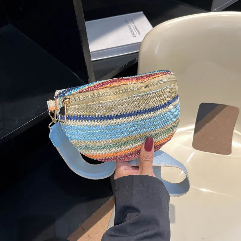 Blue woven straw beach bag with shell shape and single shoulder strap