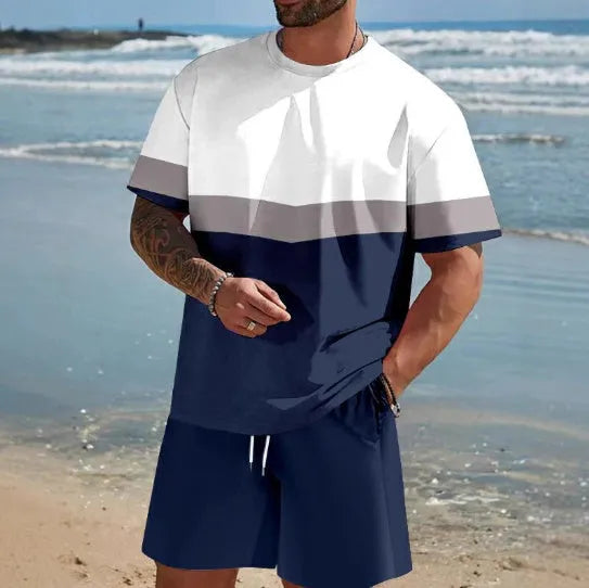 Man wearing a loose fit short sleeve t-shirt and shorts set in a solid colour for summer.