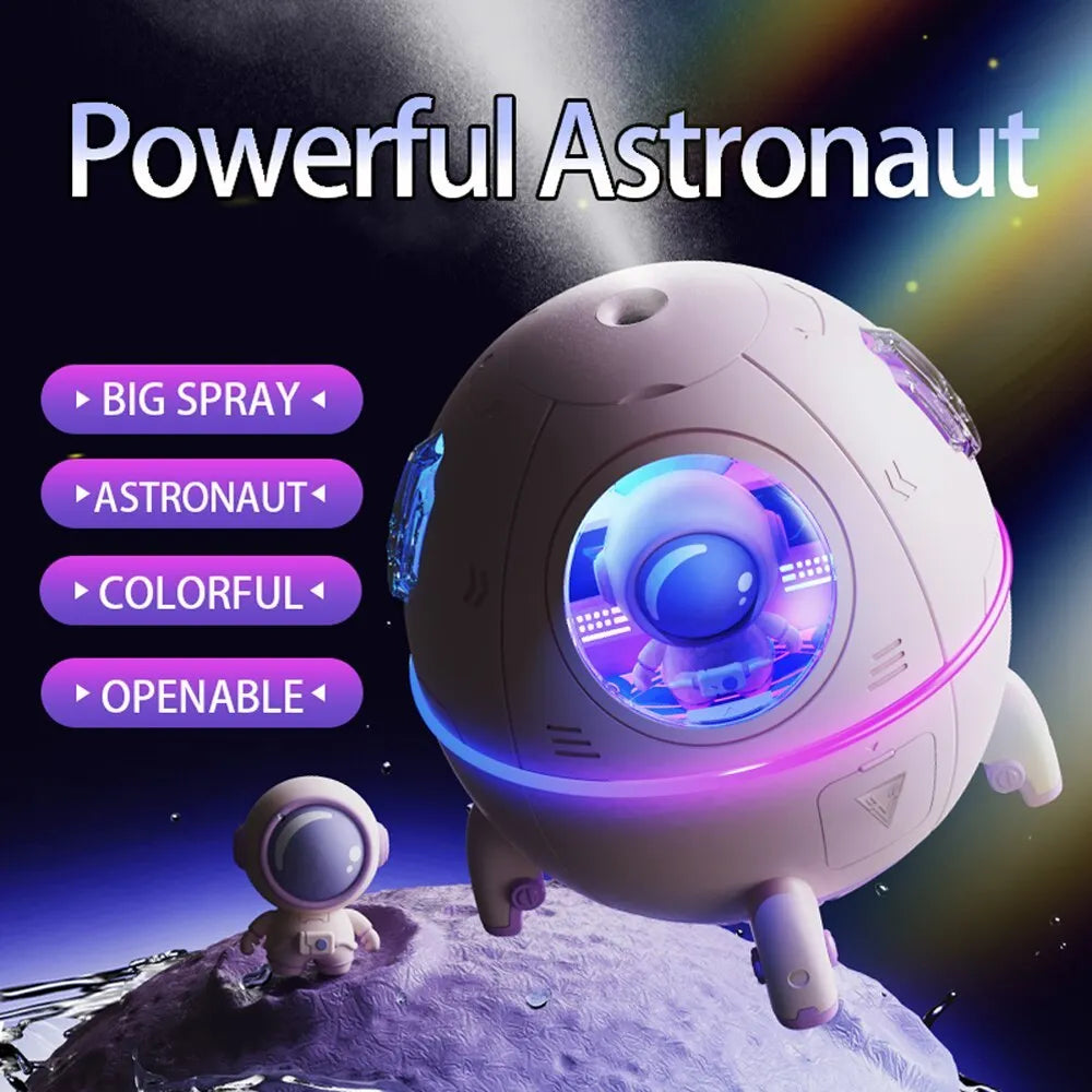 Purple astronaut-shaped USB portable humidifier with LED light on desk