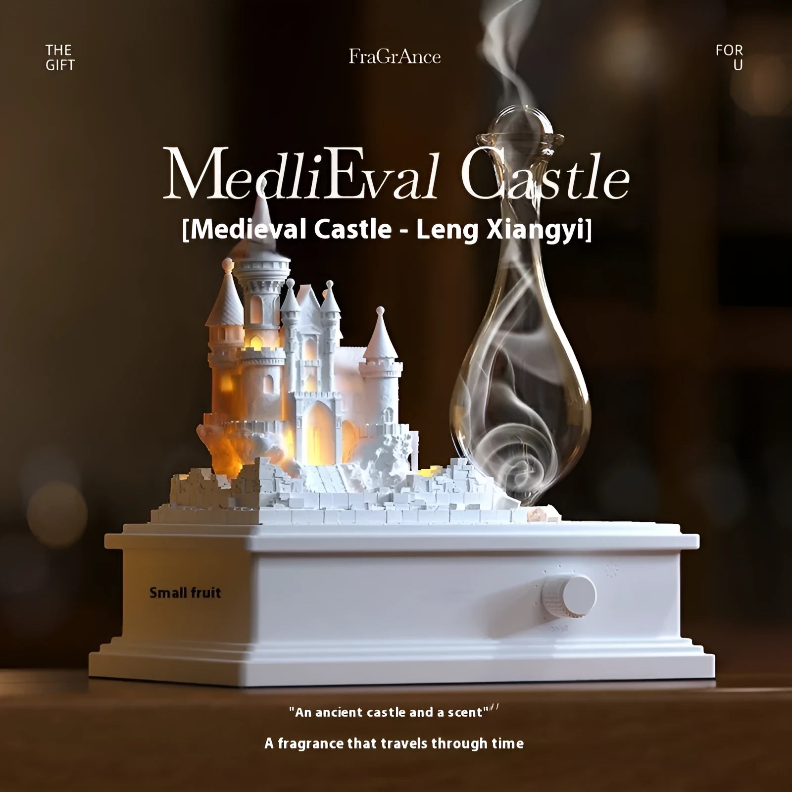 White medieval castle shaped waterless aromatherapy machine with ambient light on a wooden surface.