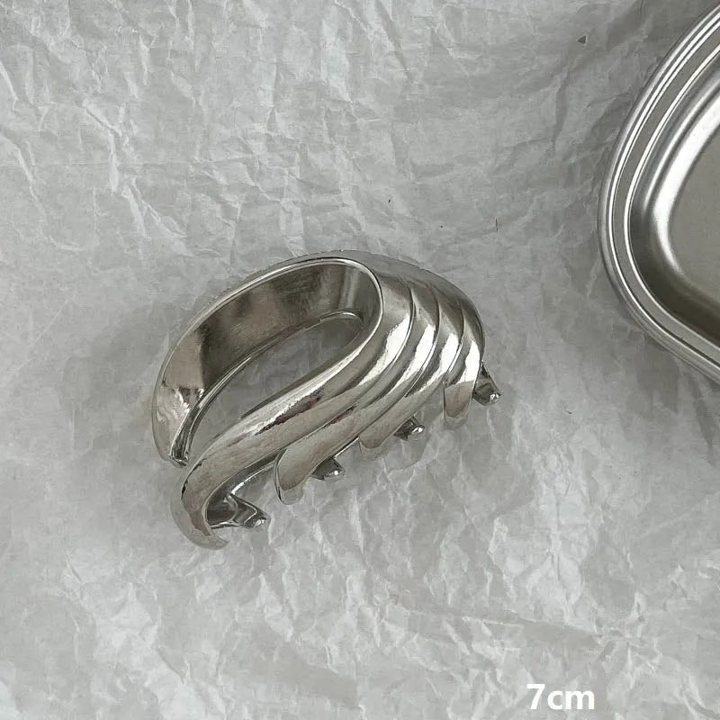 Silver metal hair barrette claw clip with electroplated finish and decorative design