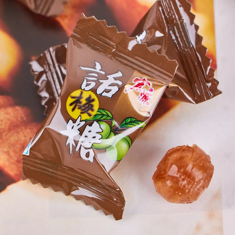 Three separate bags of hard candy: guava flavour, plum sugar flavour, and tangerine peel flavour.