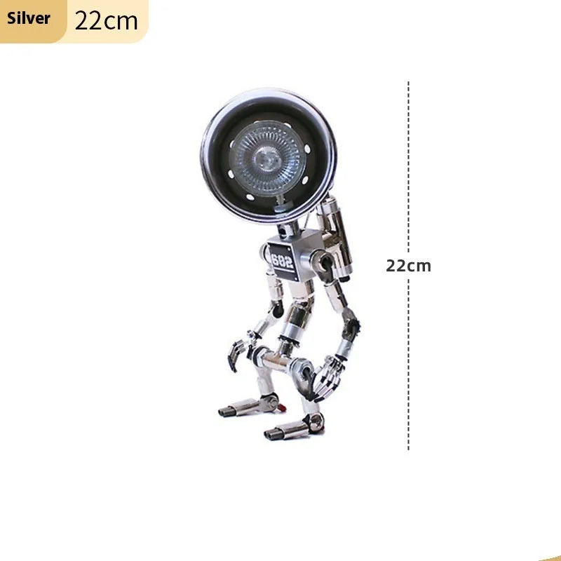 Silver copper robot-shaped atmosphere light with graphic customisation on a desk.