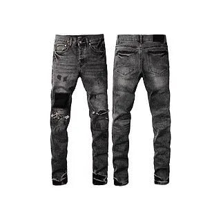 Black slim fit skinny jeans with straight leg, button fly, and manual distressing detail.