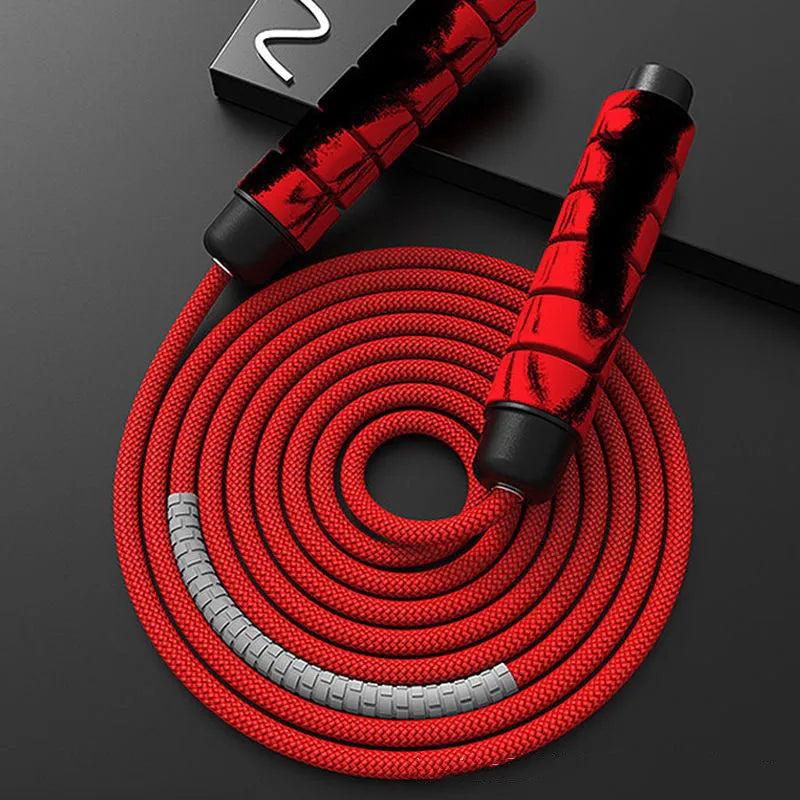 Red polyester weight-bearing skipping rope with 16cm handles on a white background