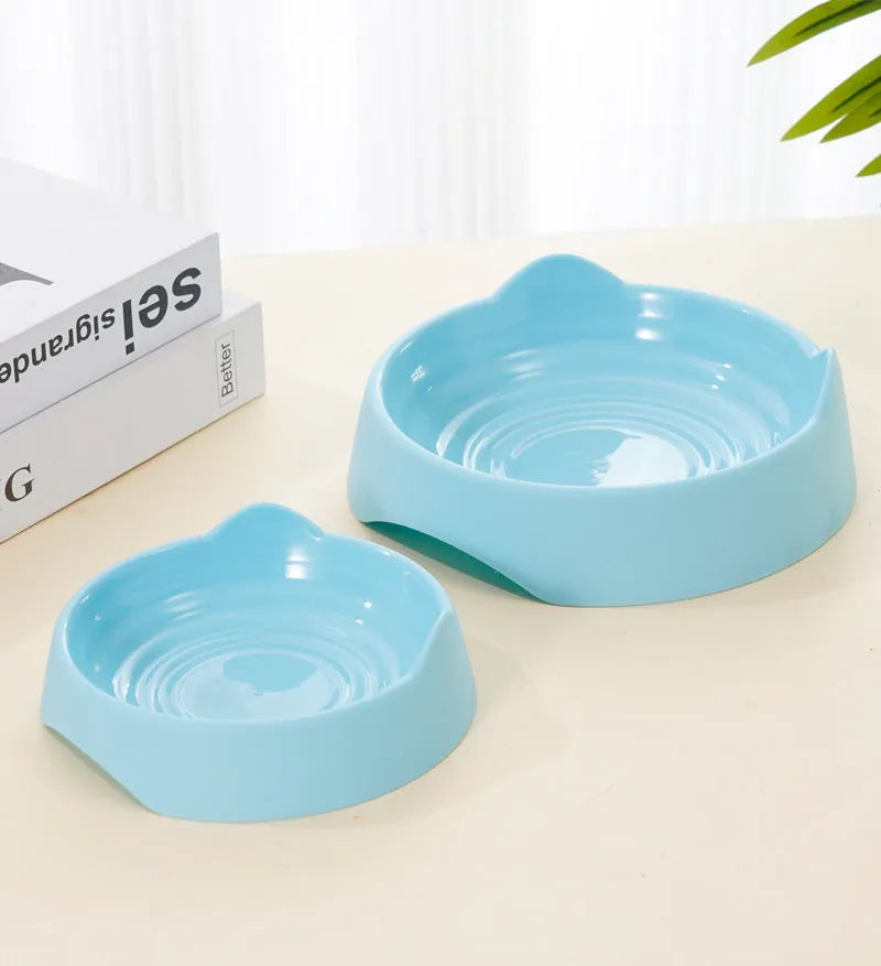 Ceramic dog slow feeder bowl with puzzle maze design in blue, green, or pink