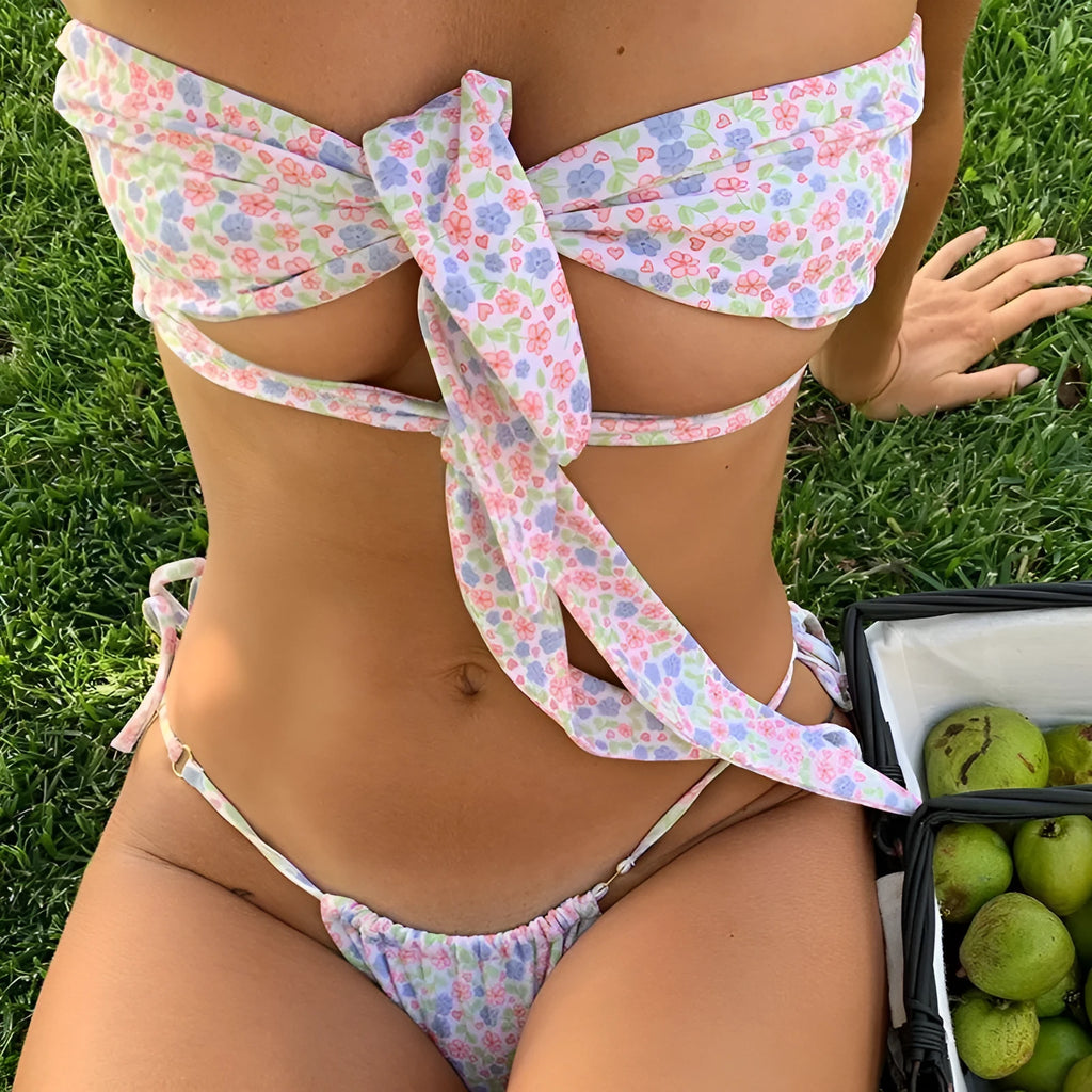 Women's wireless cup swimsuit with chest pad support and lace-up front design in floral print