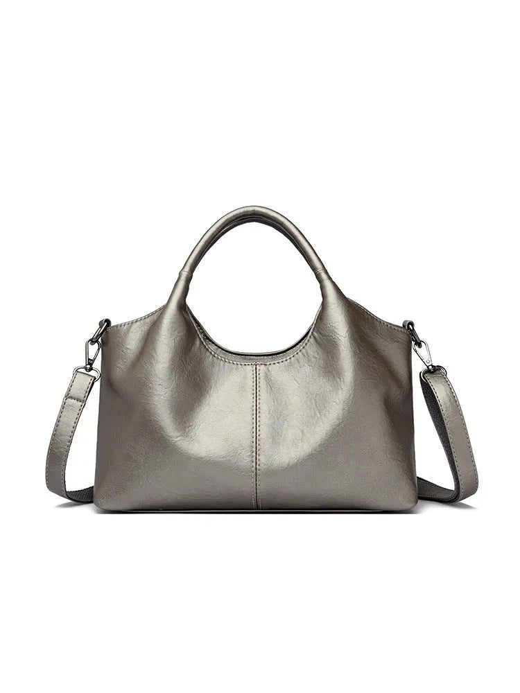 Genuine leather women's cross-body bag in black with soft texture and large capacity design