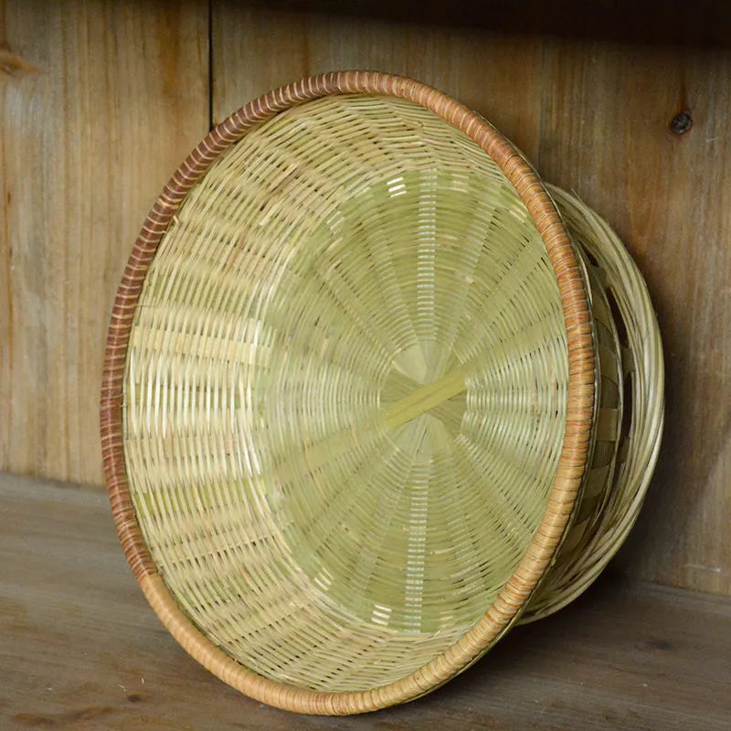 Handmade natural bamboo storage basket in a rectangular woven shape.