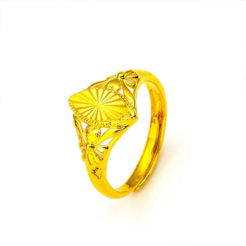 Alluvial gold open diamond flower ring with geometric textured design on brass with electroplated finish.
