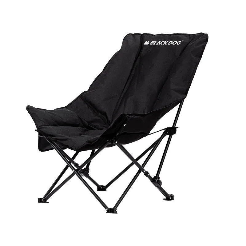 Night Black portable folding moon chair in use outdoors, showing its reclined design and carry handle.