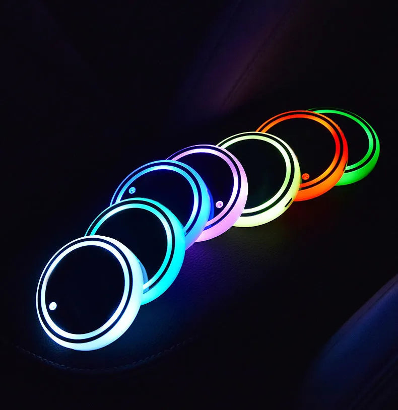 LED light-up coaster for car cup holder showing colourful illumination and 68mm diameter