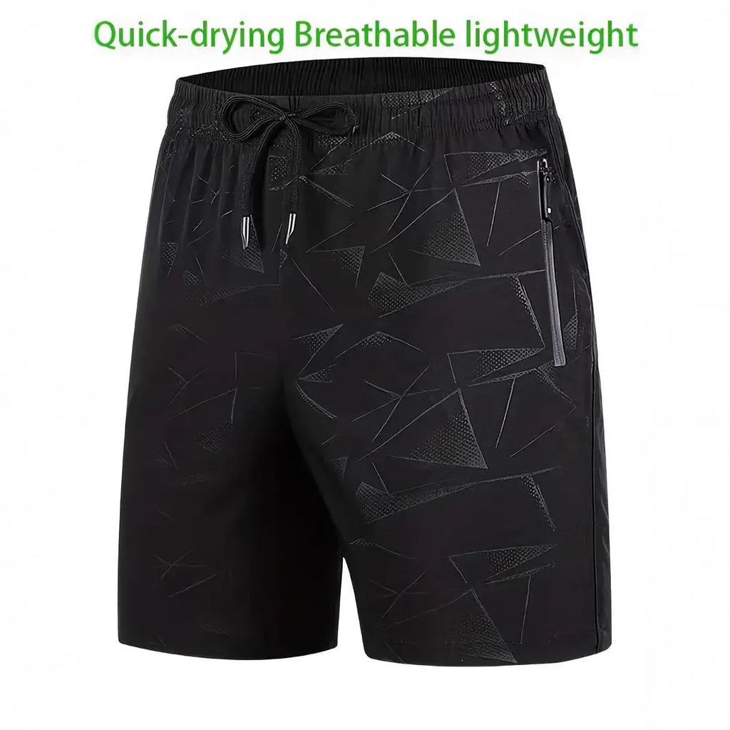 Men's loose grey polyester sports shorts with elastic waistband on a white background
