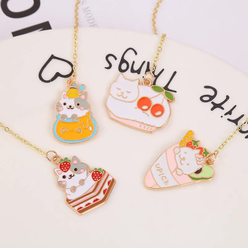 Jane Lime metal bookmark with cartoon cat pendant in four designs measuring 3.8x18.3cm