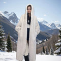 Loose plus size long brown leopard print faux fur coat on a hanger
