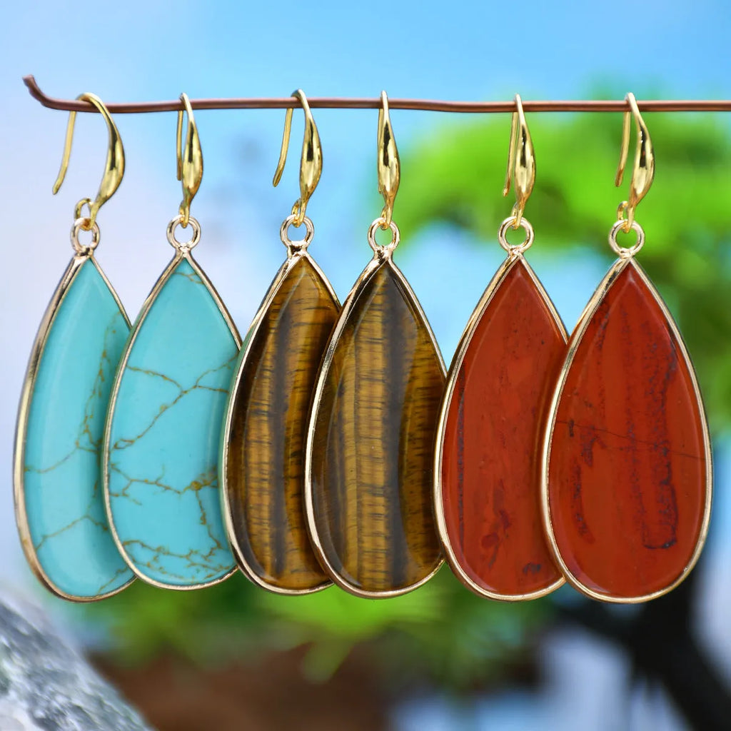 Vintage tigereye stone drop earrings with elongated water drop shape and textured elements