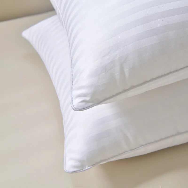 White cotton satin stripe pillow with feather cotton filling, shown in low, medium, and high loft versions.