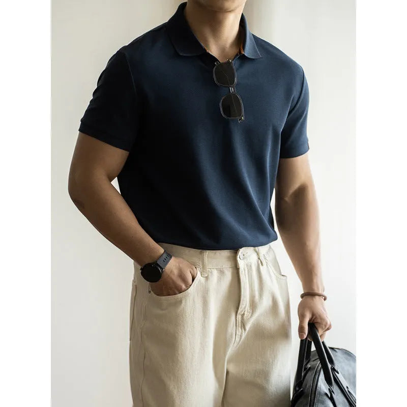 American-style blue cotton polo shirt with short sleeves on hanger