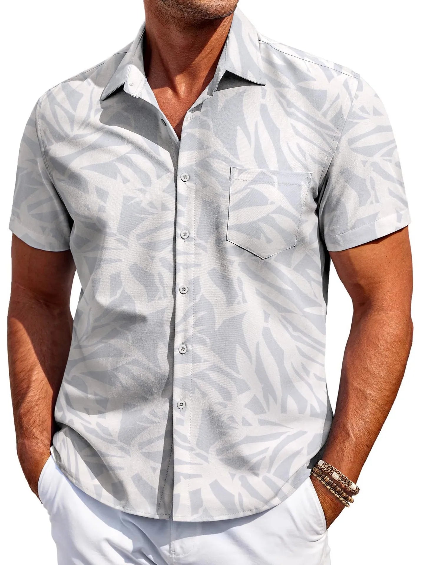 A man wearing a slim-fit short-sleeve shirt in a solid colour, showing the cardigan style and elastic fabric.